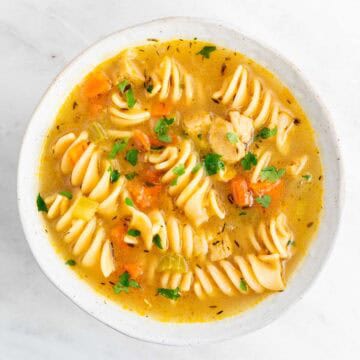 Vegan chicken noodle soup in a dish.