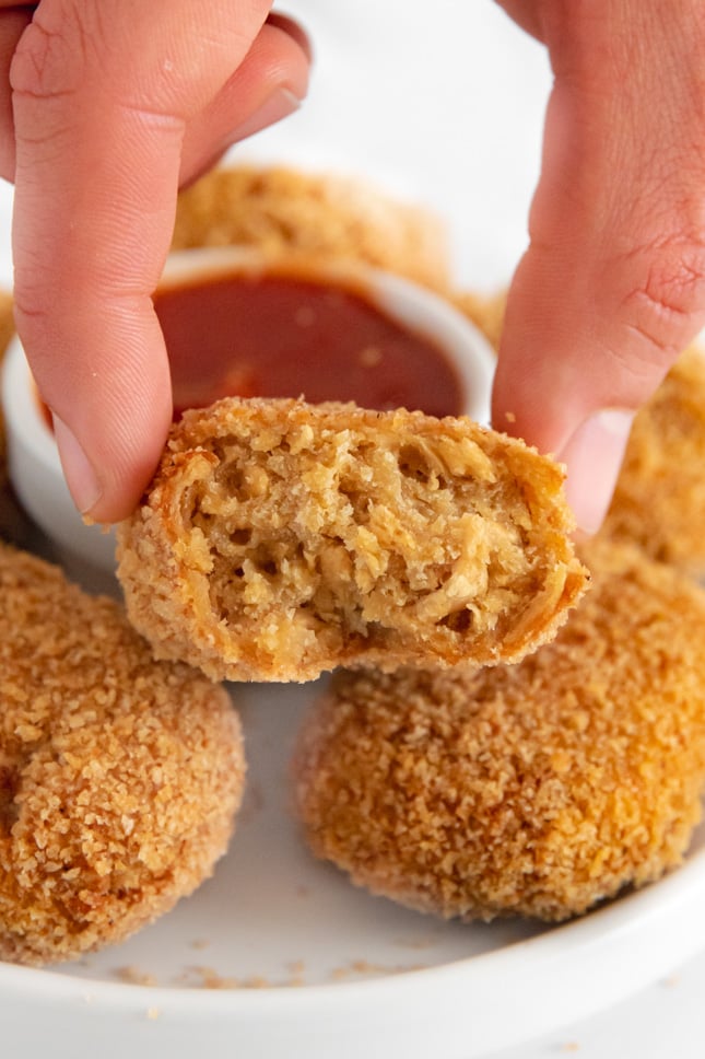 Photo of a vegan chicken nugget cut in half