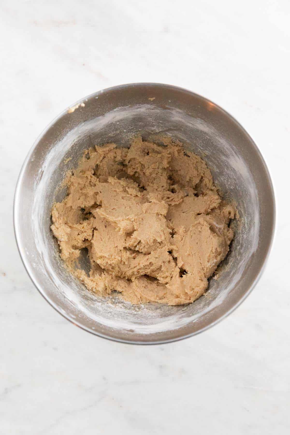 The wet and dry ingredients mixed in a large bowl.