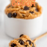 Photo of a spoonful of vegan cookie dough with the words vegan cookie dough