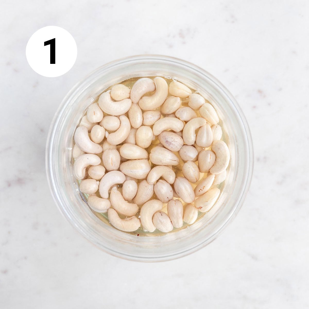 Soaked cashews in a bowl.
