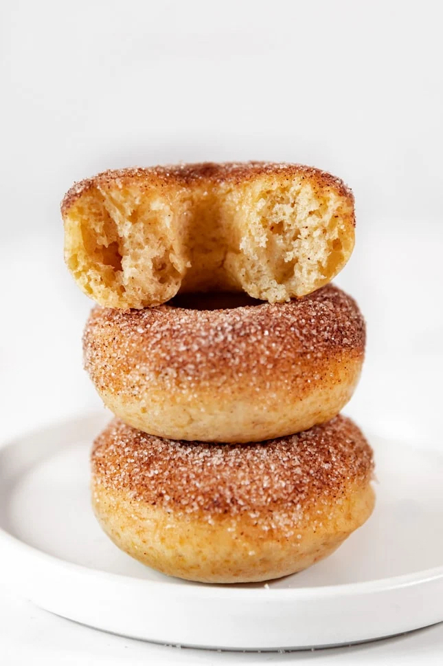Side photo of a pile of vegan donuts