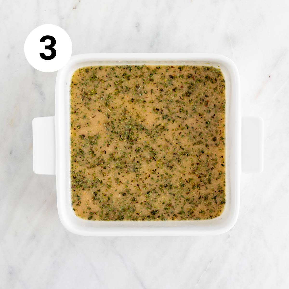 Tofu marinade in baking dish.