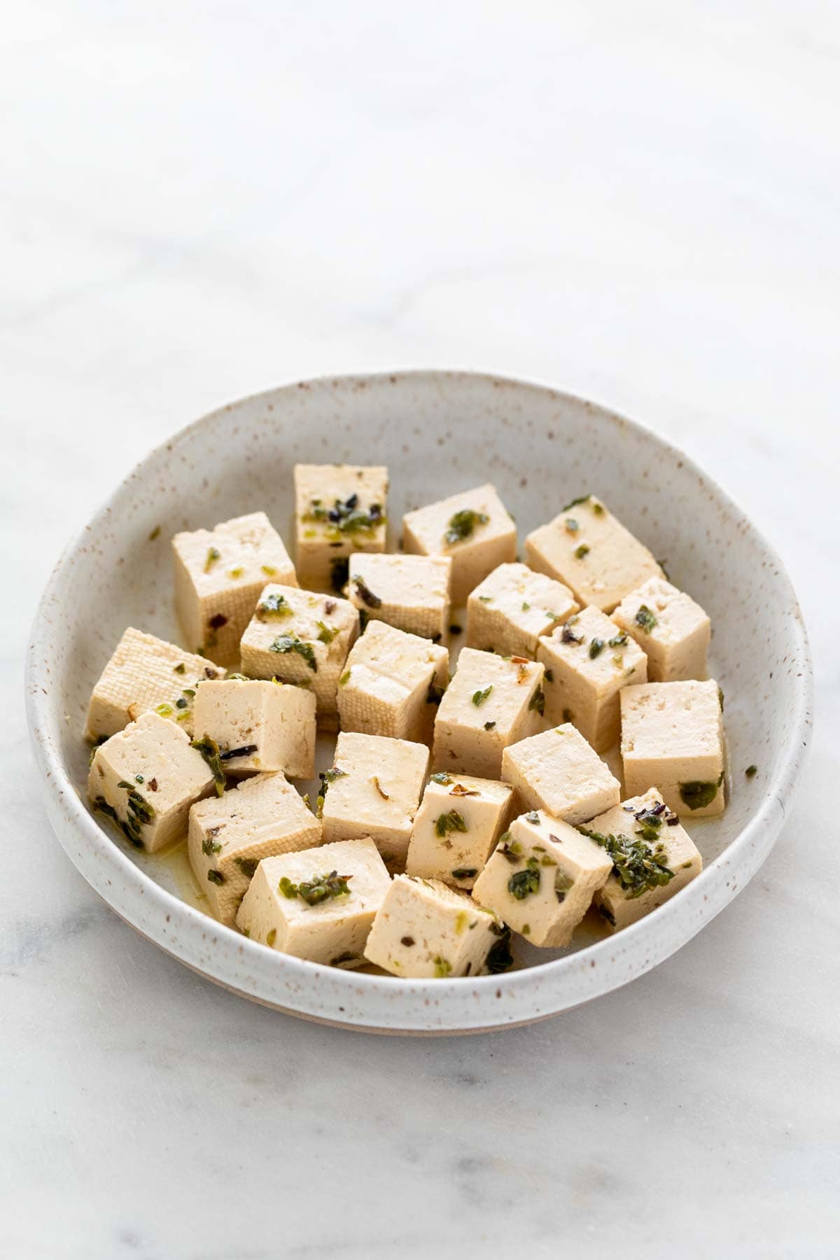 Vegan feta cheese in a dish.