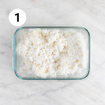 Container filled with cooked rice.