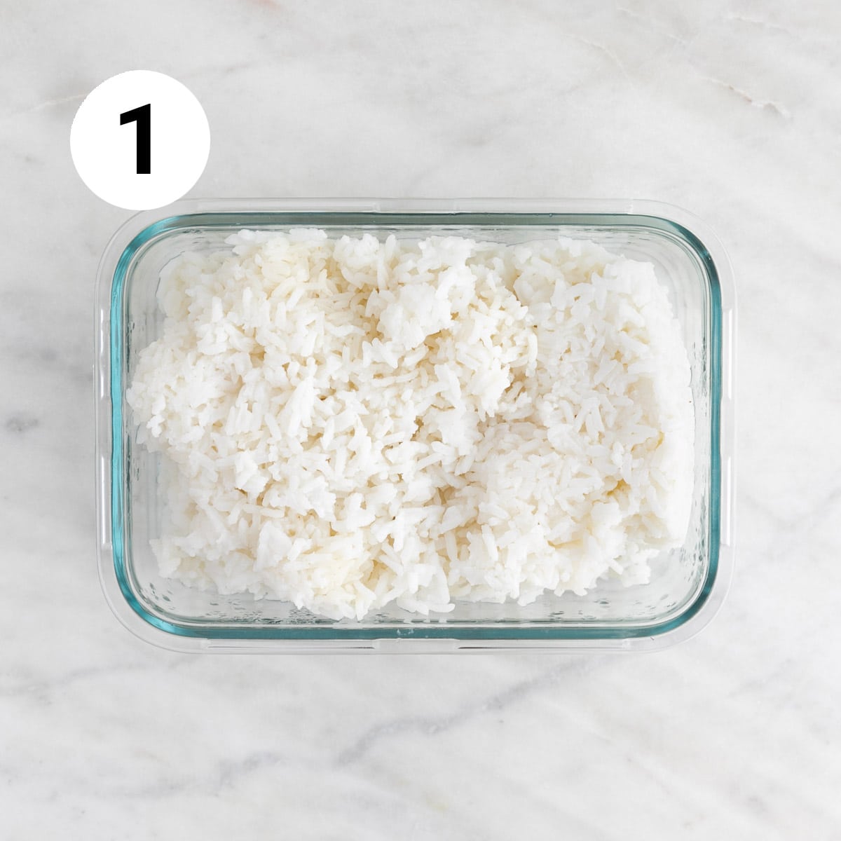Container filled with cooked rice.