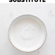 Small bowl containing vegan heavy cream substitute.