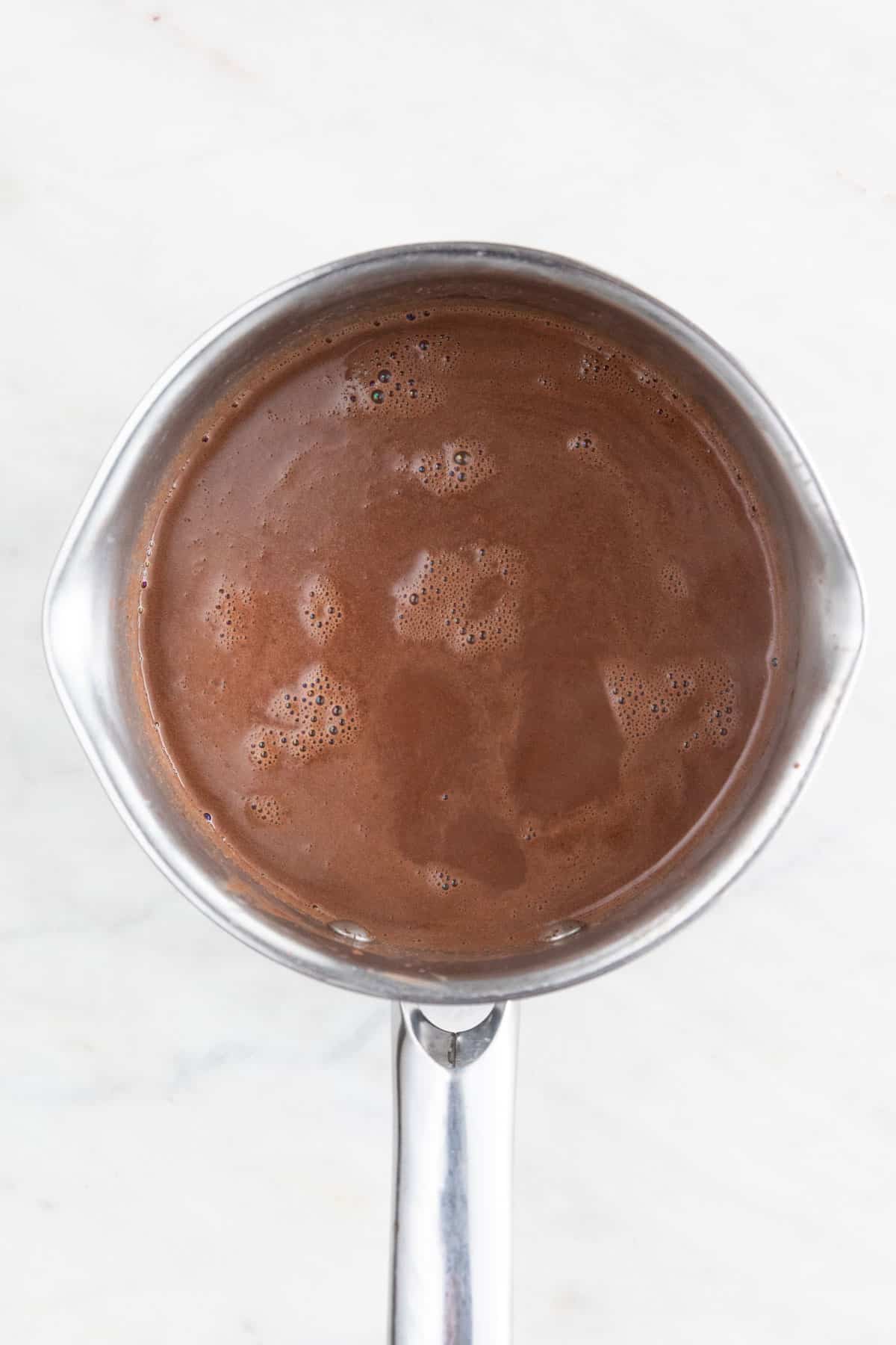 A saucepan with vegan hot chocolate.
