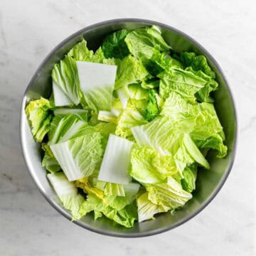 Chopped cabbage in a bowl.