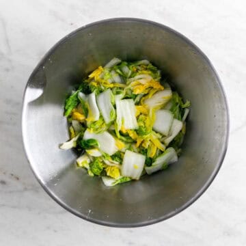 Cabbage in a bowl after resting for 2 hours with salt and water.