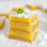Square photo of some vegan lemon bars