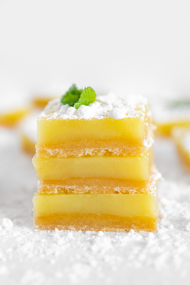 Photo of a pile of vegan lemon bars