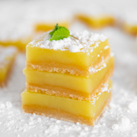 Square photo of some vegan lemon bars