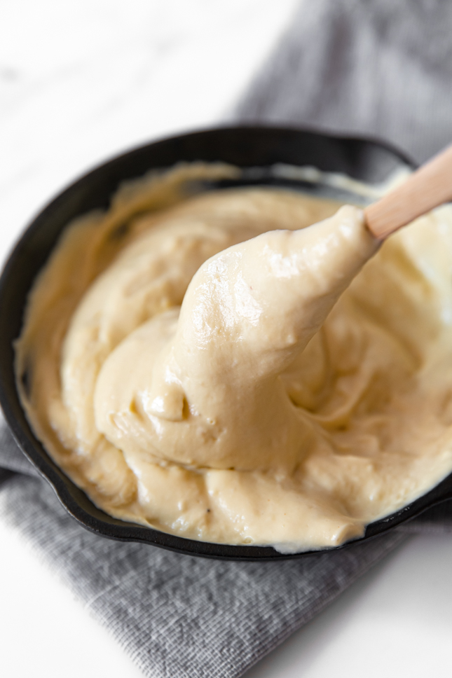 Photo of a spoonful of vegan mozzarella