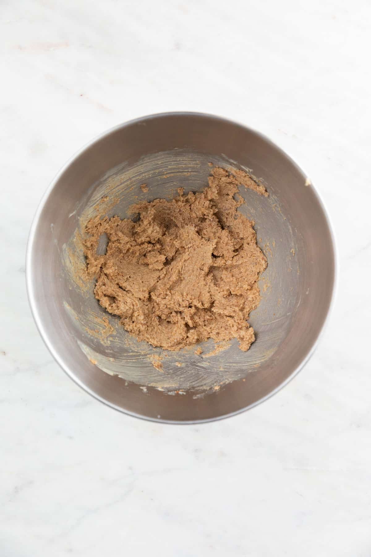 The vegan butter, brown sugar, and granulated sugar mixed in a large bowl.