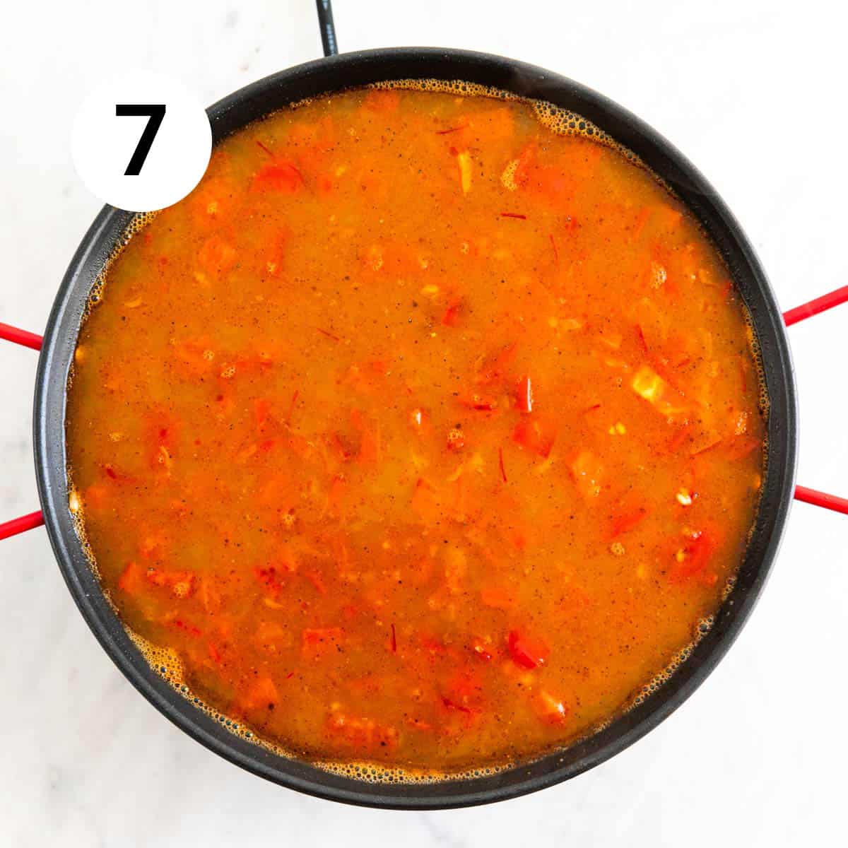 Vegan paella after adding the salt and pepper and before cooking.