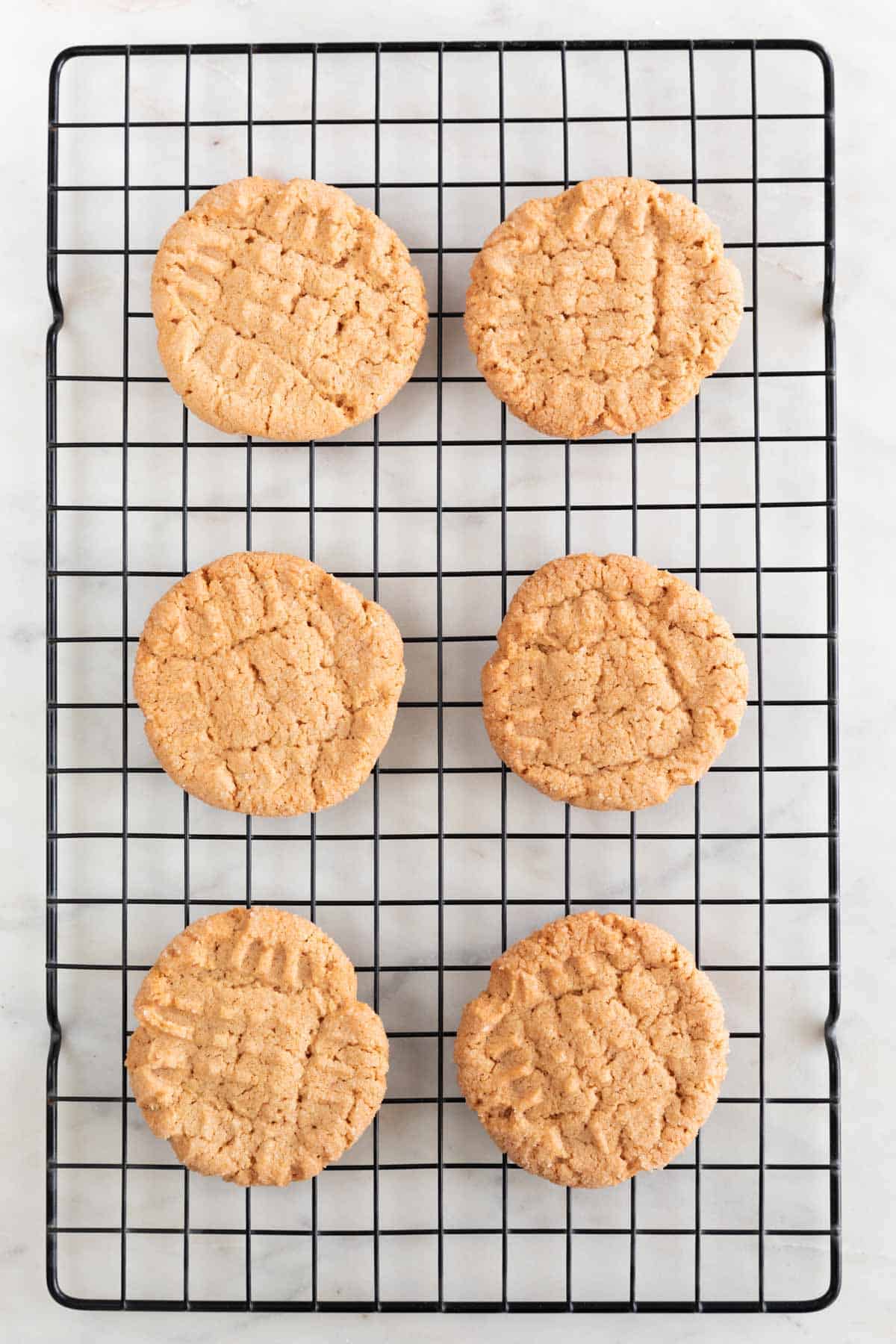 Cookies cooling onto a cooling rack.