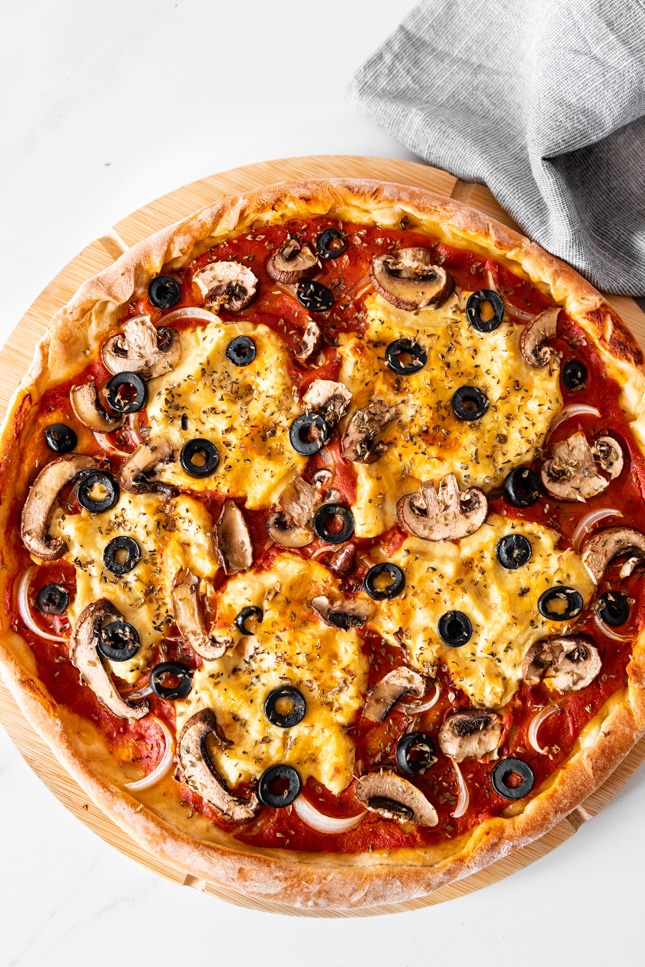Photo of a whole vegan pizza