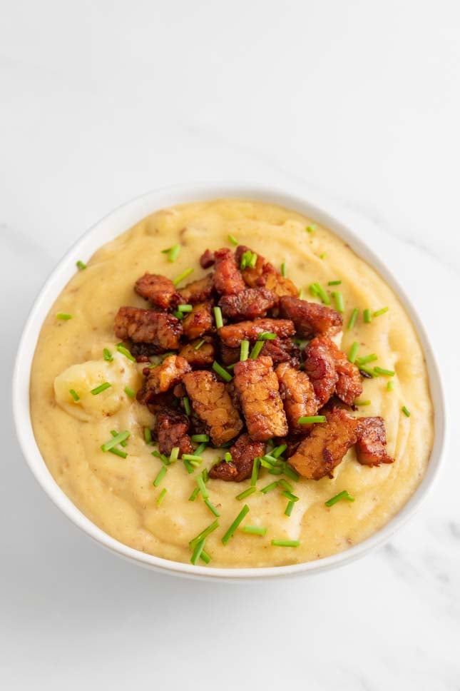Photo of a bowl of vegan potato soup taken from the above