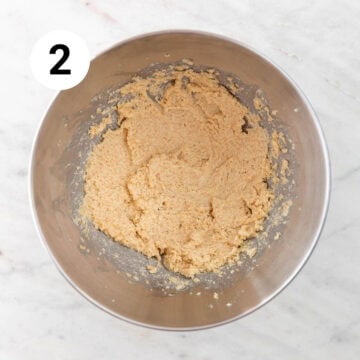 Vegan butter, granulated sugar, and brown sugar beaten in a stand mixer bowl.