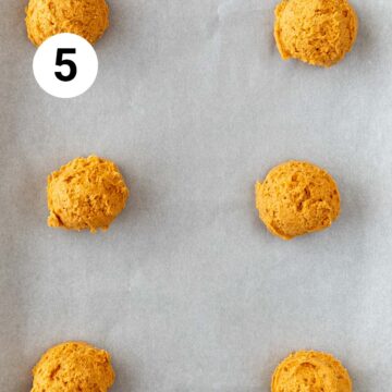 Vegan pumpkin cookies onto a lined baking sheet before baking.