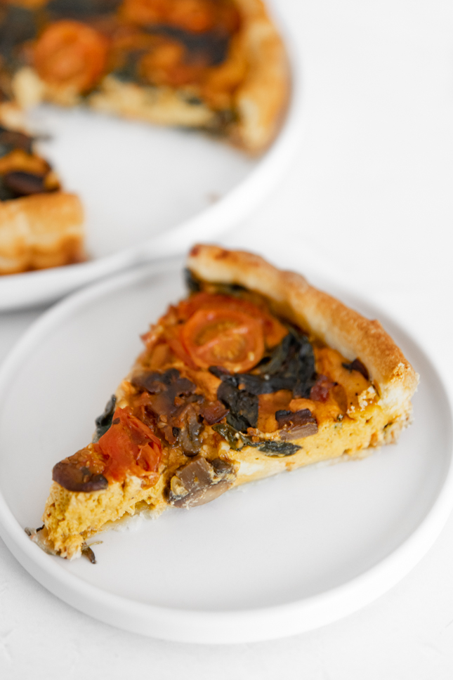 Photo of a slice of vegan quiche
