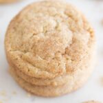 Photo of a pile of vegan snickerdoodles with a heading