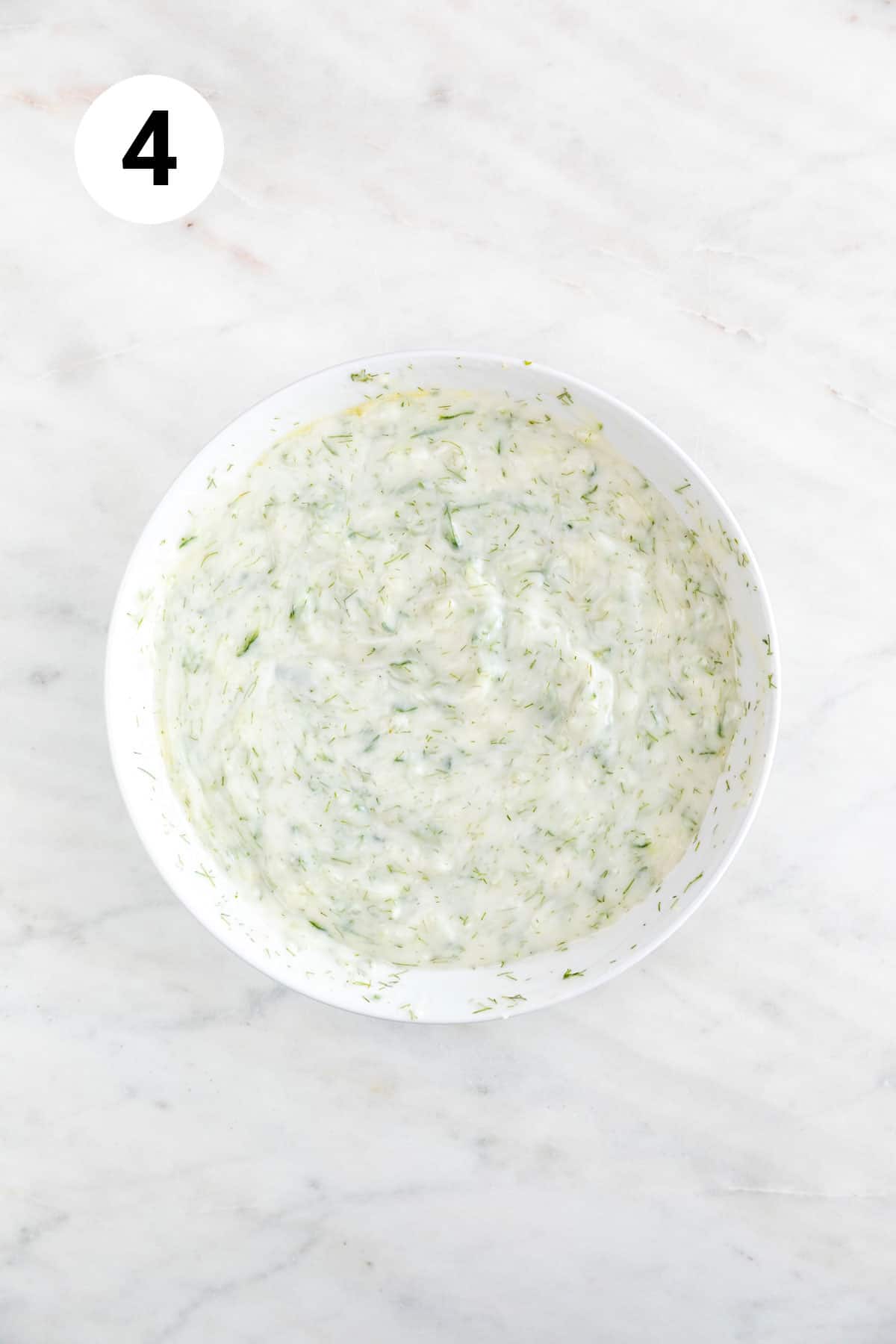Vegan tzatziki sauce in a bowl.