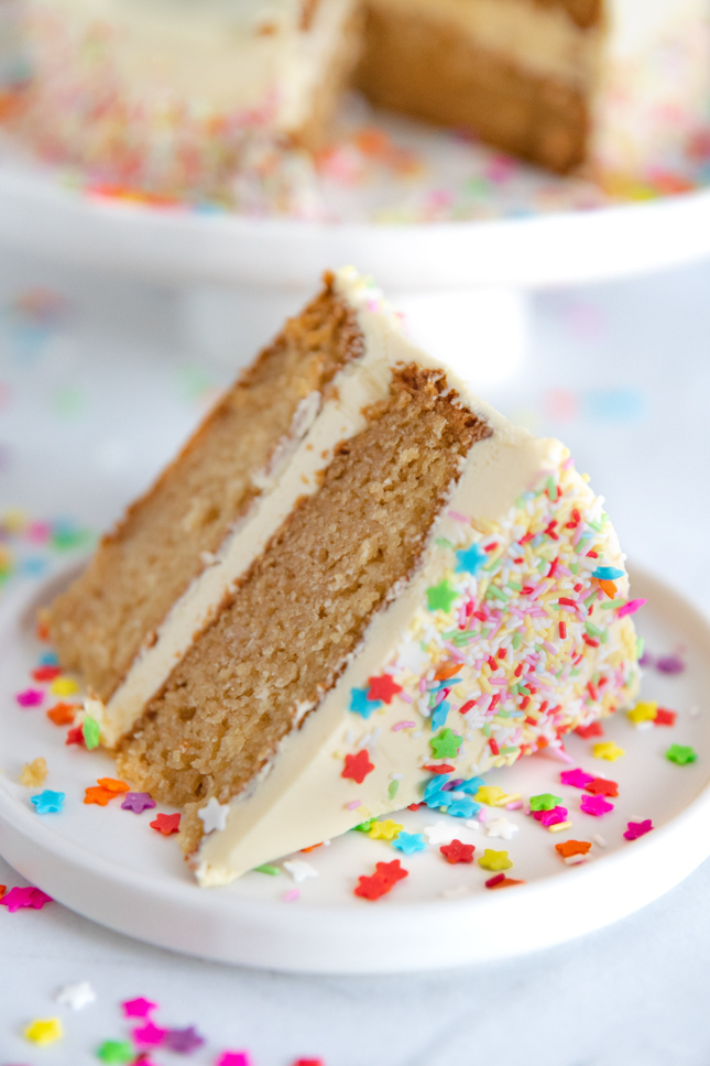 Photo of a piece of vegan vanilla cake