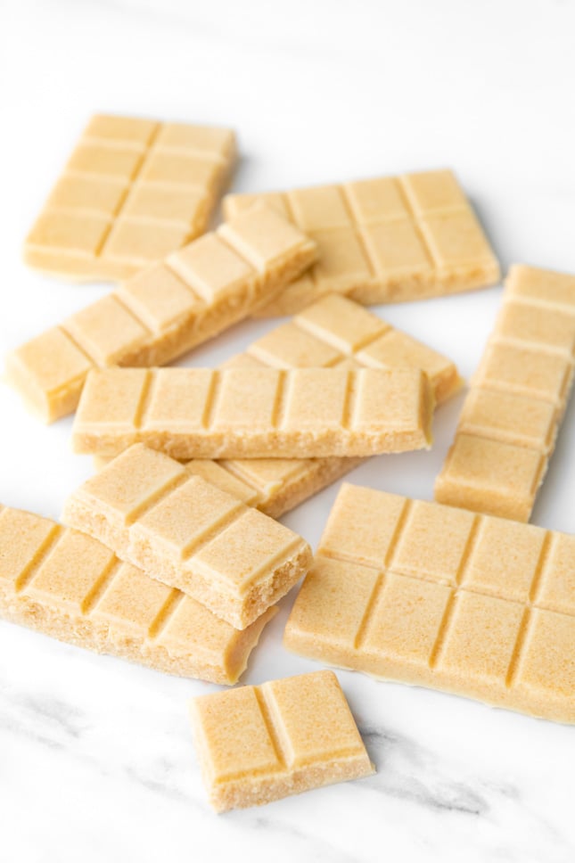 Photo of some pieces of vegan white chocolate