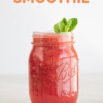 Side shot of a jar of watermelon smoothie with the words watermelon smoothie